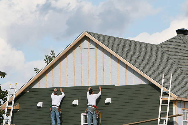 Professional Storm Damage Siding Repair technician working in Portland, TX